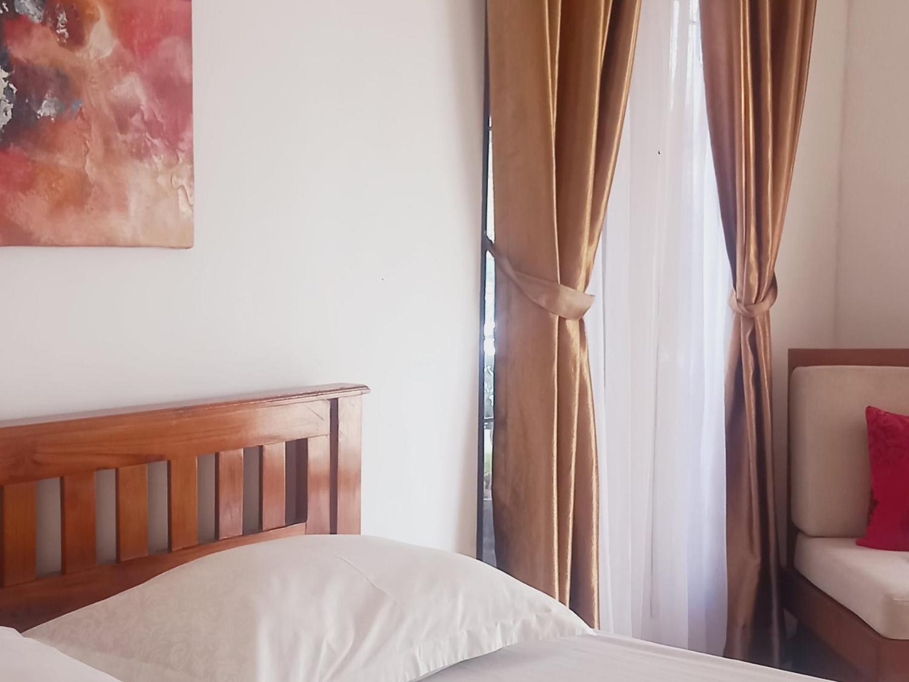 Inang Amang Homestay Labuan Bajo Rum bild